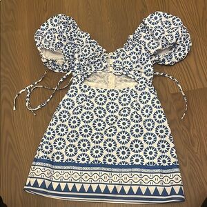 Blue and White Dress with puffy sleeves and ties in front